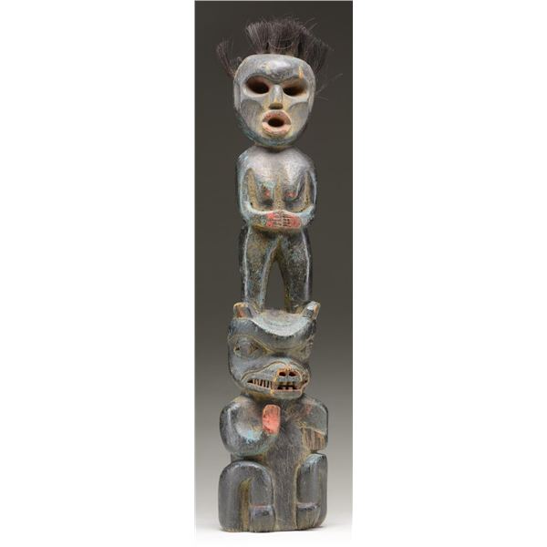 SMALL CARVED TOTEM.