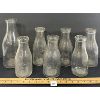 Image 2 : LOT OF 7 - EMBOSSED DAIRY BOTTLES - INCL CAUFIELD & BARN ALLANDALE, ETC.