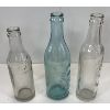 Image 2 : LOT OF 3 - EMBOSSED SODA & WATER BOTTLES - INCL THE WULF BOTTLING WORKS, ETC. 