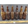 LOT OF 6 - EMBOSSED AMBER BLOB TOP BOTTLES - INCL REINHARDT BROS, MONROE, ETC.