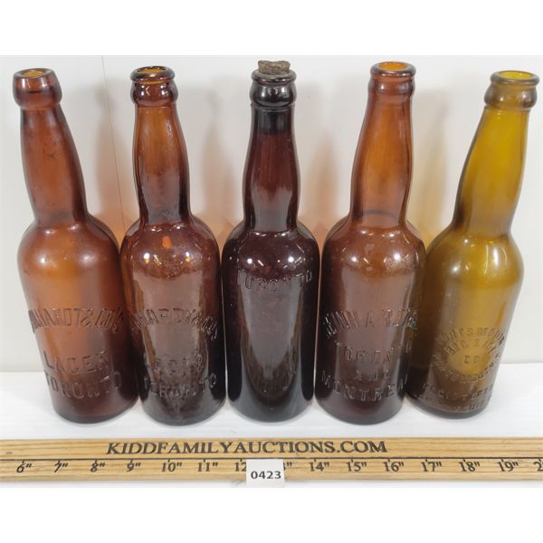 LOT OF 5 - AMBER BOTTLES - INCL O'KEEFE & REINHARDT & CO., ETC.