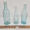Image 2 : LOT OF 3 - EMBOSSED BOTTLES - INCL C.H. NORTON, ROYAL AERATED WATER COMPANY, ETC. 