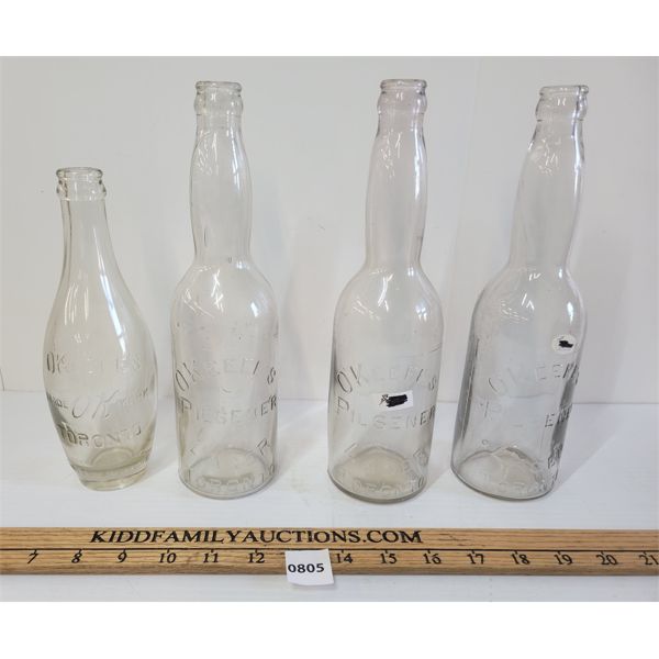 LOT OF 4 - EMBOSSED O'KEEFE'S PILSENER LAGER BOTTLES 