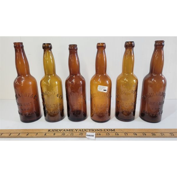 LOT OF 6 - EMBOSSED REINHARDT & CO. BOTTLES 