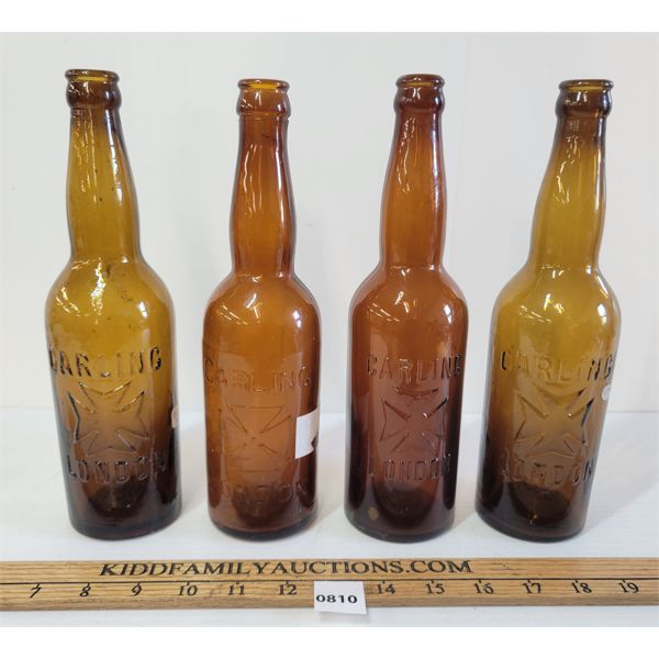 LOT OF 4 - EMBOSSED CARLING BOTTLES 