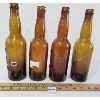 Image 2 : LOT OF 4 - EMBOSSED CARLING BOTTLES 