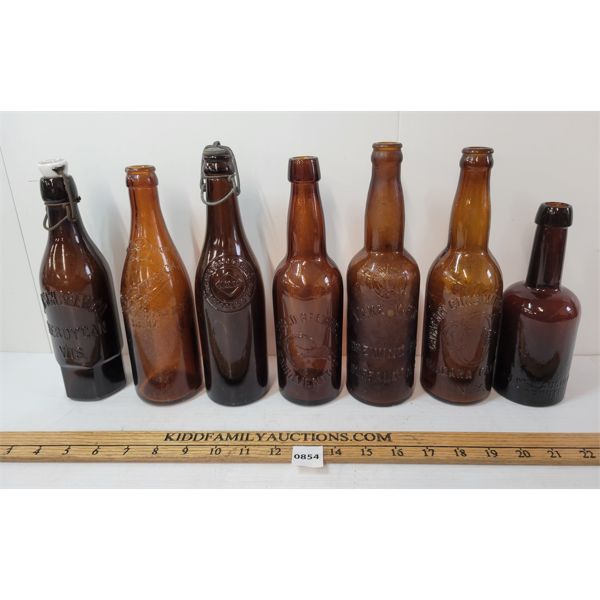 LOT OF 7 - EMBOSSED BOTTLES - INCL BUFFALO BREWING CO., LAKE VIEW, ETC. 
