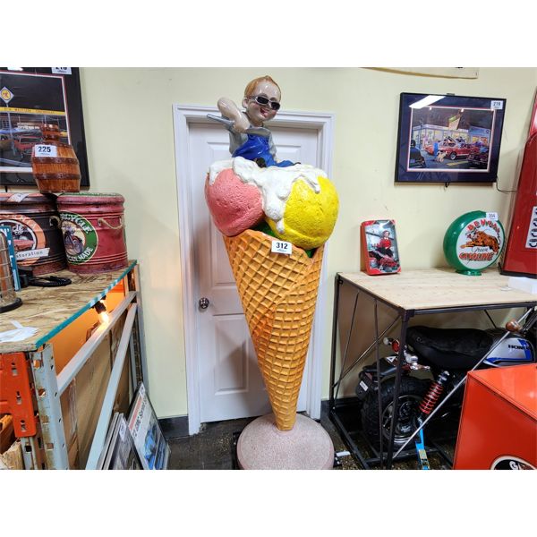 Large ice cream cone and boy statue