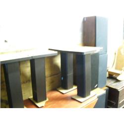 6 speakers and 4 speaker stands (99)