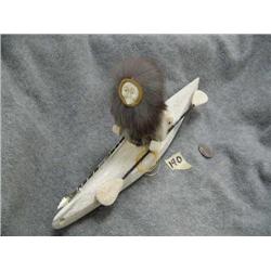 Ivory and Whalebone Kayaker by Ivan Anariak man  has inset Ivory face and hands Seal has Baleen eyes