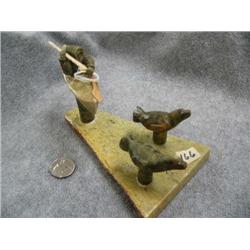 7" Soapstone Kayaker and 2 Seals (2)