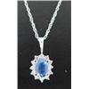 Image 1 : Sapphire and Diamond Pendant and Chain 14 K white gold- sapphire is oval, faceted, approx. 0.50 cara