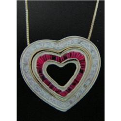 Ruby and Diamond Heart Pendant and Chain 10 K yellow gold- rubies are baguette cut, approx. 0.50 car