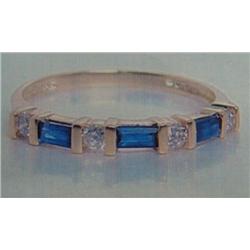 Sapphire and Diamond Lady's Ring 18 K yellow gold- sapphire are baguette, faceted, approx. 0.25 cara