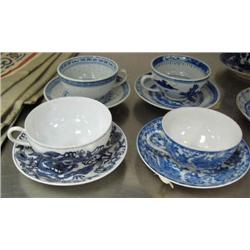 Lot of 4 oriental blue and white tea cups and saucers (74)