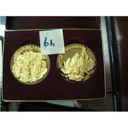 CHOICE on 9 sets of 2 commemorative silver medallions with 24 K gold overlay: Battle of Wounded Knee