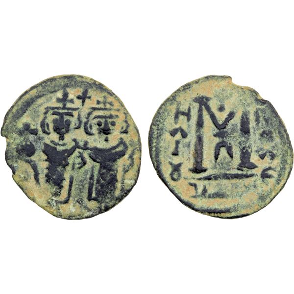 ARAB-BYZANTINE: Two Standing Figures, ca. 680s, AE fals (2.33g), Ba'albakk, ND, choice VF