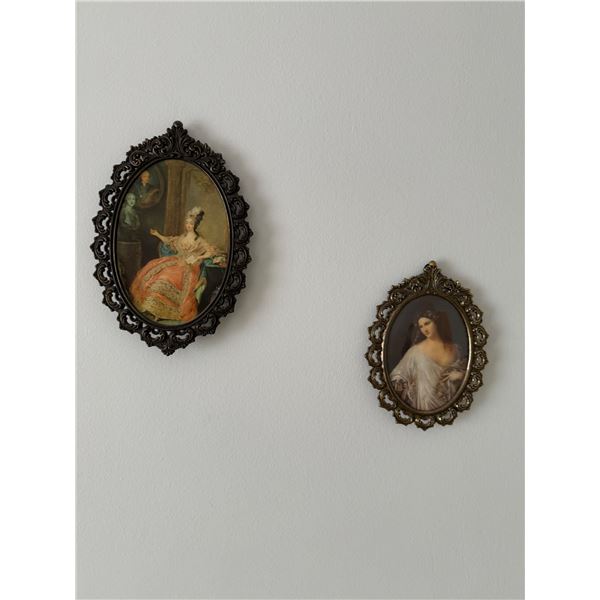 4 smaller metal framed pictures