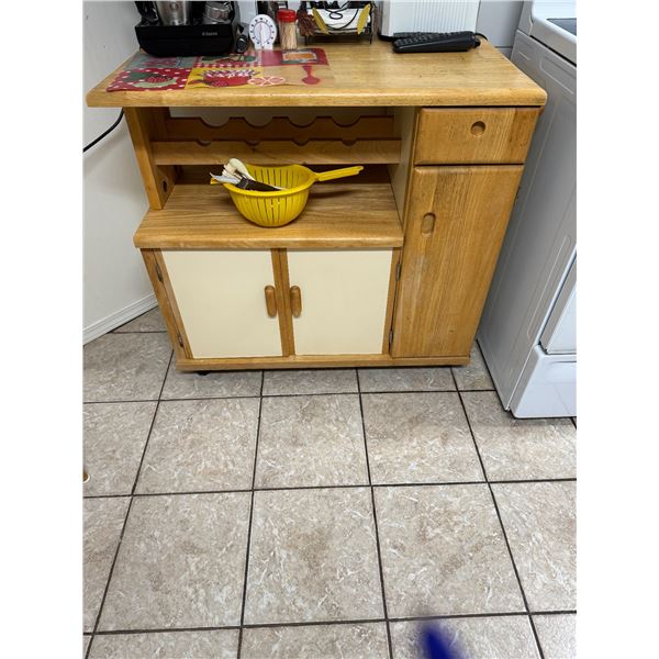 Cabinet on wheels 38 inches long including the wheels 22 deep and 34 tall