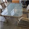 Image 8 : GLASS TOP PATIO TABLE AND 4 RECLINING CHAIRS