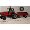 Image 1 : Metal Ertl International Tractor & Massey Ferguson trailer.