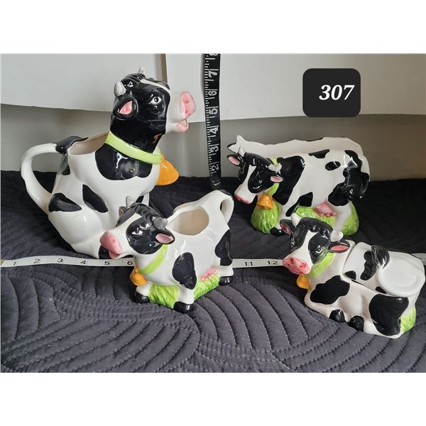 Ceramic Cow juice jug, napkin holder, creamer & sugar cows.