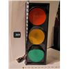 Image 1 : Electric, colour changing stop light. Made in Canada.