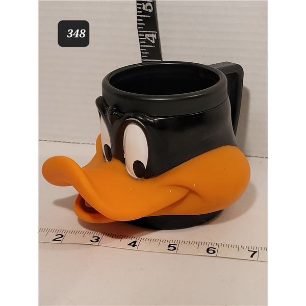 1992 Warner Bros. Daffy Duck mug.