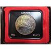 Image 1 : 1972 Specimen Silver Dollar. Housed in its original Royal Canadian Mint black clamshell case of issu