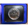 Image 1 : 1976 Specimen Nickel Dollar. Housed in its original Royal Canadian Mint blue clamshell case of issue