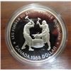 Image 1 : 1988 Proof Silver Dollar. Commemorates the first heavy industry in Canada. Housed in its original Ro