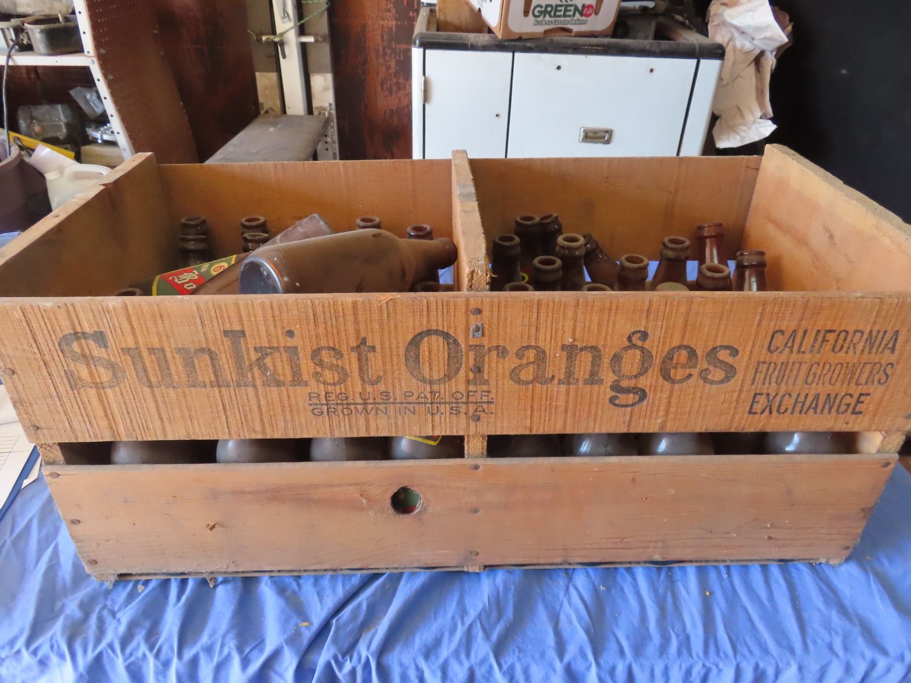 vintage sunkist box with assorted older beer bottles - Schmalz Auctions