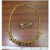 Image 1 : Vintage amber rhinestone clip on earrings and necklace