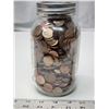 Image 2 : Mason jar filled with Canadian/US pennies