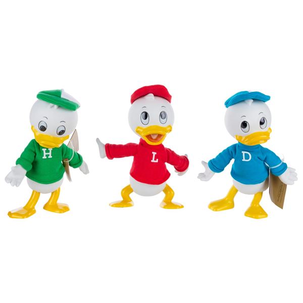 A Set of Huey, Dewey, and Louie Porcelain Figures.