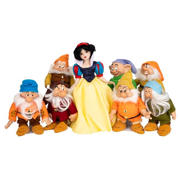 A  Snow White and the Seven Dwarfs  Porcelain Doll Set.