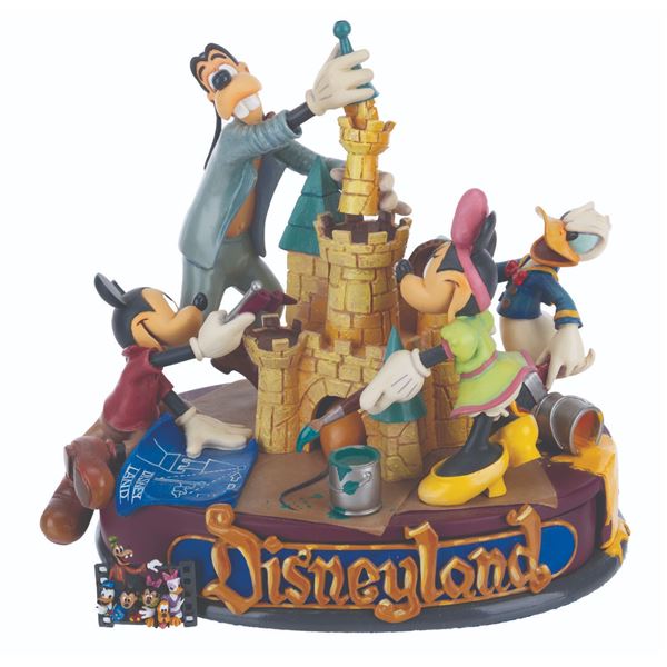 A Disneyland 50th Anniversary Trinket Box and Pin.