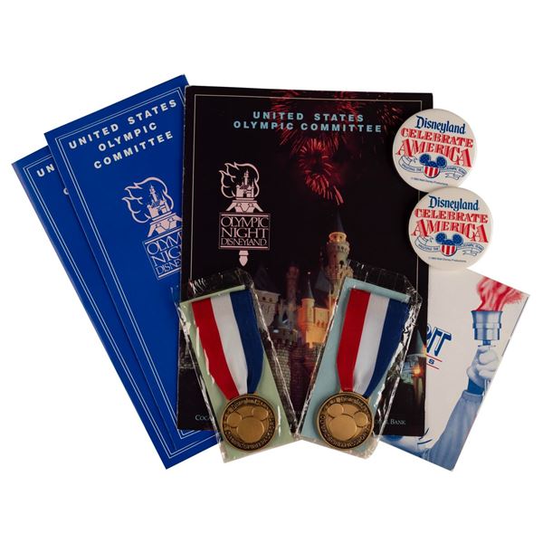 A Pair of Olympic Spirit Passport Medals and Items.