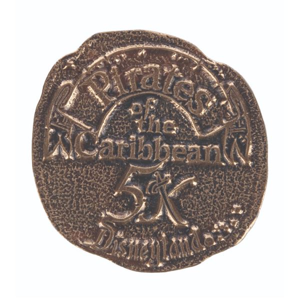 A Pirates of The Caribbean Cast Member Event 5K Coin.