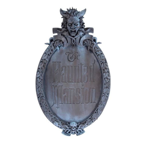 A Haunted Mansion Decorative Plaque.