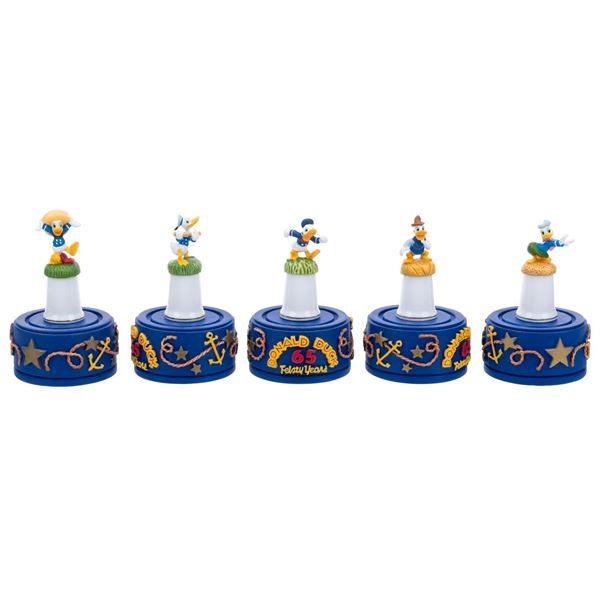 A Set of Donald Duck 65th Anniversary Thimbles.