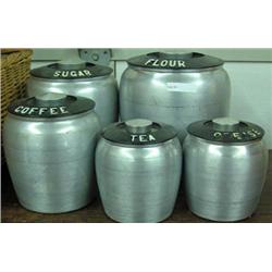 Five Piece Chrome Canister Set With Black Plastic Lids