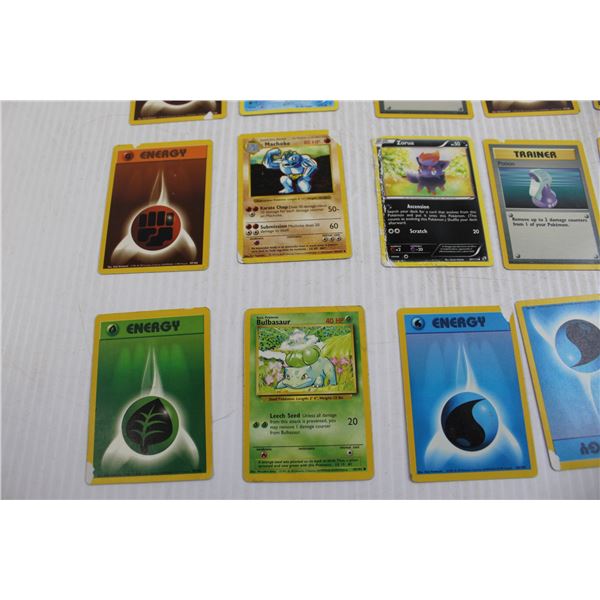 1999 Official Pokemon Handbook, (25) Mostly Energy Pokemon Cards - Bodnarus Auctioneering 1999 Official Pokemon Handbook, (25) Mostly Energy Pokemon Cards - Bodnarus Auctioneering