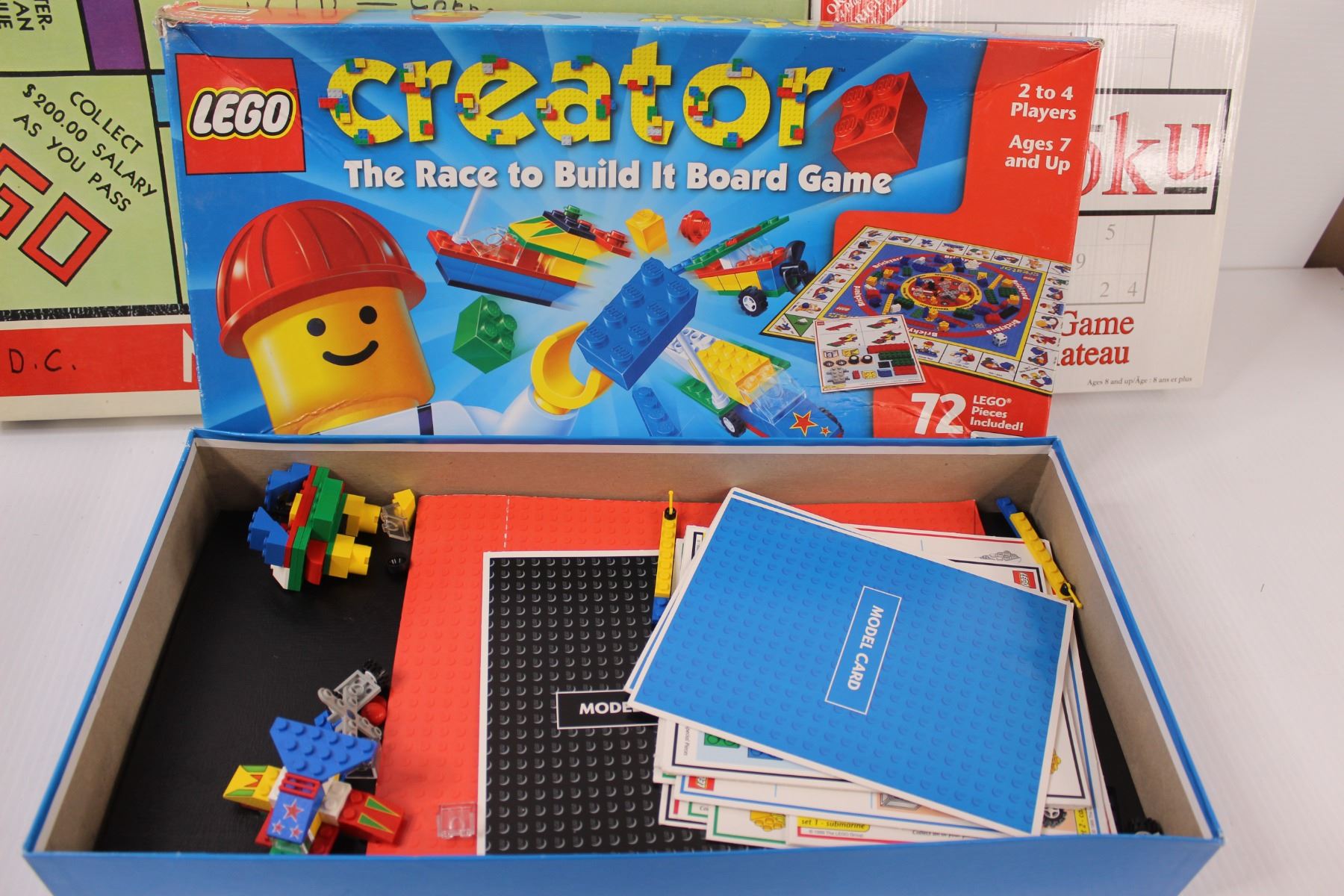 3) Board Games: Sudoku, Monopoly, Lego Creator As Is Bodnarus