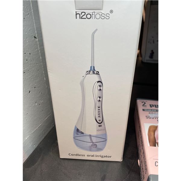 H20 floss cordless oral irrigator