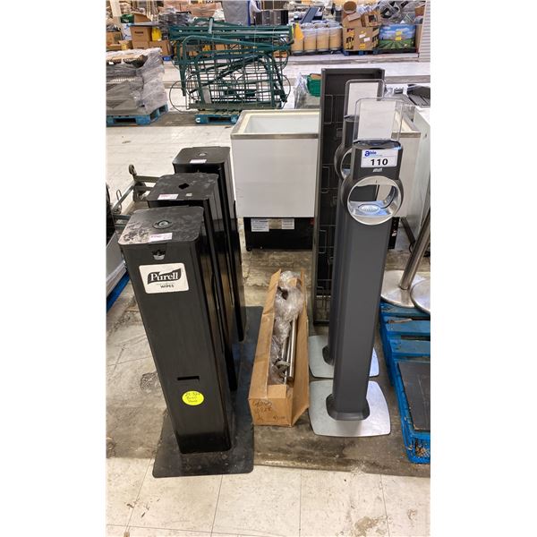 5 COMMERCIAL SANITATION STATIONS, 4 SECTION METAL MAGAZINE RACK, & BOX OF BRUSH NICKEL DOOR HANDLES