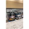 Image 1 : 9 PALLETS OF COMPLETE WHITE METAL PHARMACY GONDOLA SHELVING