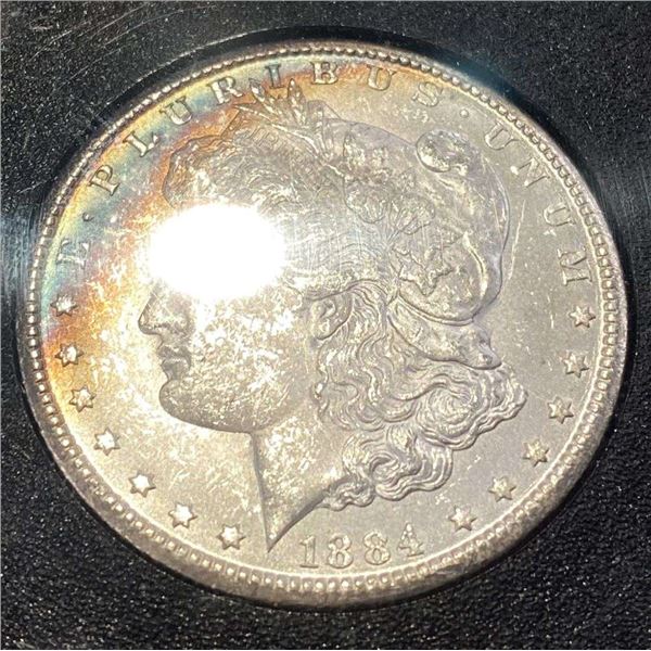 Doube Rainbow 1884-CC Morgan Silver Dollar GSA PCGS MS63