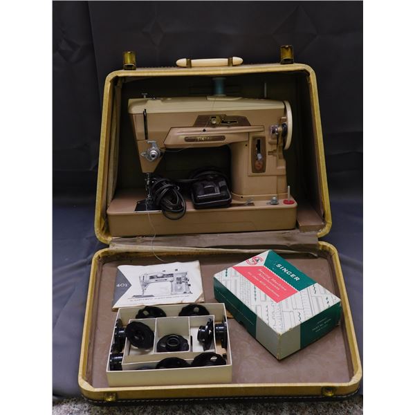 Singer Sewing Machine in Case, & Box of Machine Attachments