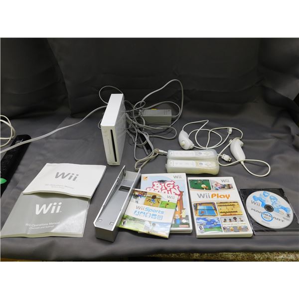 Nintendo Wii (1st gen model, backwards compatible) with 2 Wii Motes, 2 Nunchuks, Cables, 3 Games